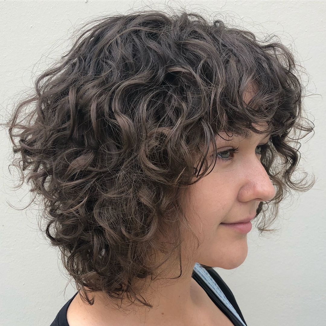 25 Must Try Medium Length Layered Haircuts For 2022 For Most Recent Layered Curly Medium Length Hairstyles (View 18 of 25)