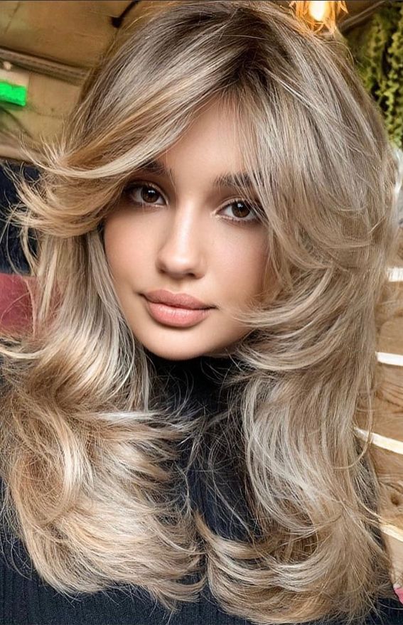 35 Best Layered Haircuts 2021 : Blonde Layered Volume Haircut With Regard To Latest Elongated Layered Haircuts With Volume (View 8 of 25)