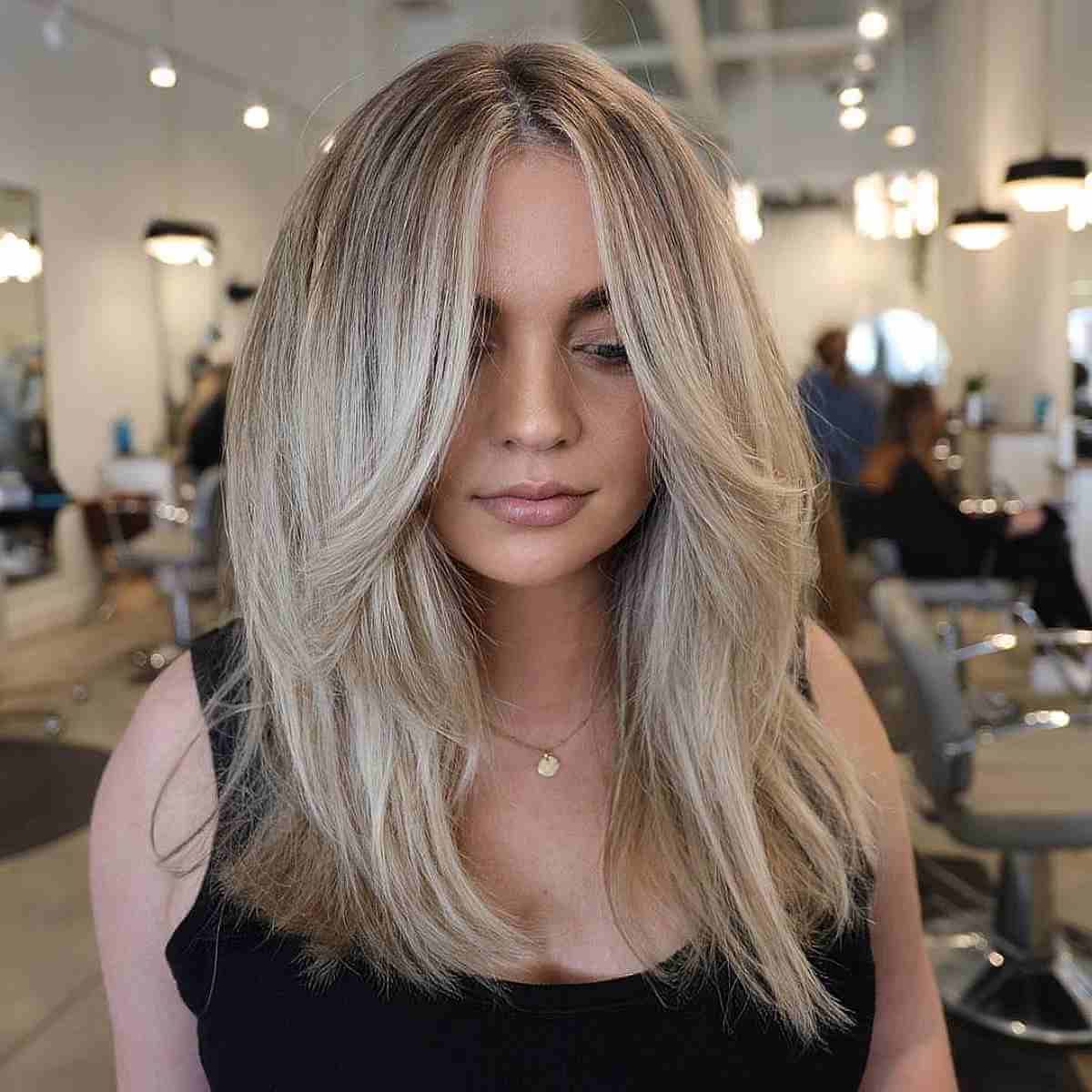 43 Flattering Middle Part Hairstyles Trending Right Now Throughout Current Middle Parted Medium Length Hairstyles (View 4 of 25)