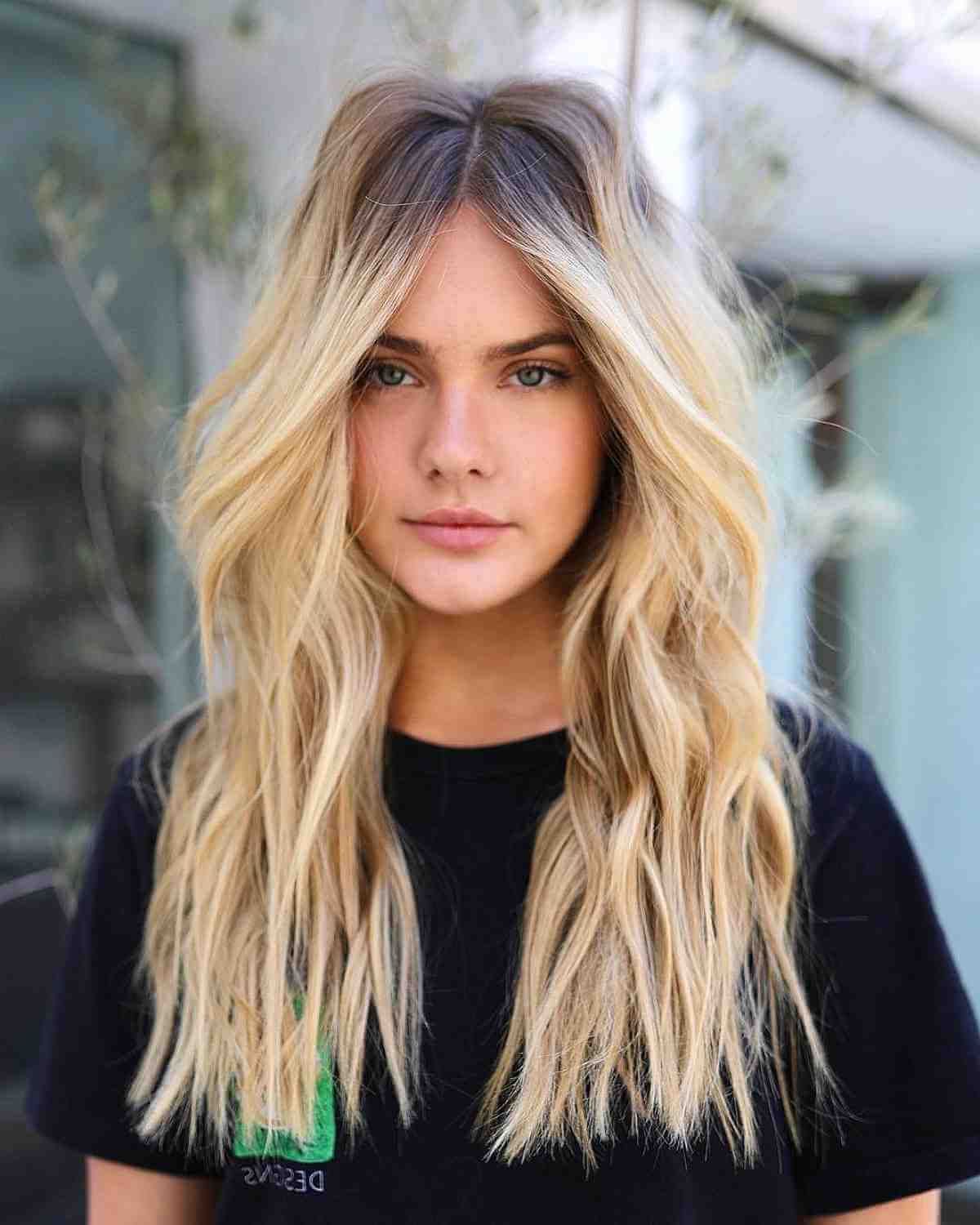43 Flattering Middle Part Hairstyles Trending Right Now With Regard To Most Up To Date Wavy Medium Hairstyles With Middle Part (View 12 of 25)