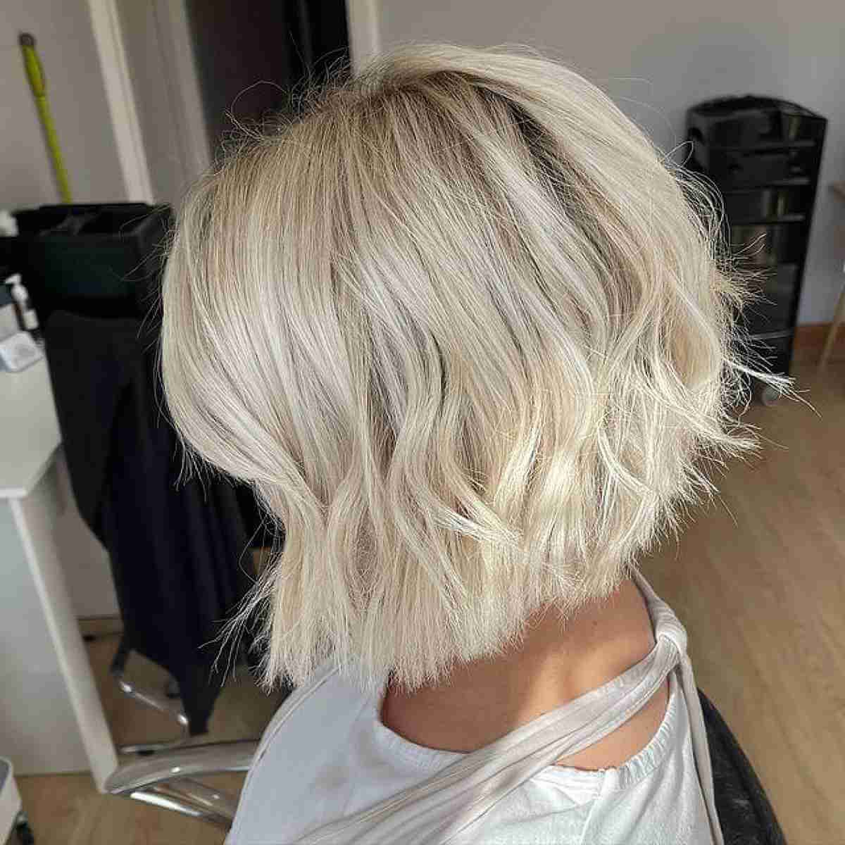 50+ Inverted Bob Haircuts Women Are Getting In 2022 With Messy, Wavy &amp; Icy Blonde Bob Hairstyles (Photo 19 of 25)