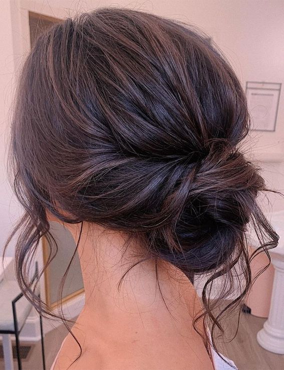 75 Trendiest Updo Hairstyles 2021 : Pretty Relaxed Low Bun For Most Up To Date Wavy Low Updos Hairstyles (Photo 24 of 25)