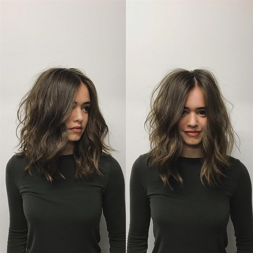 Brunette Layered Cut With Messy Wavy Texture And Center Part – The Latest  Hairstyles For Men And Women (2020) – Hairstyleology Within Recent Brunette Textured Medium Length Hairstyles (View 11 of 25)