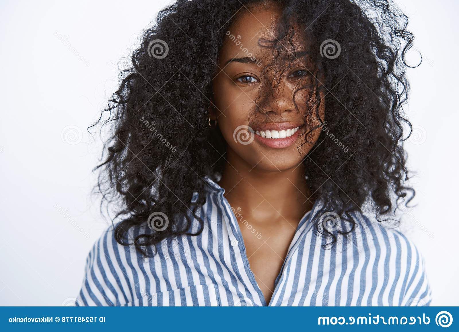 Close Up Positive Carefree Happy Good Looking Smiling African American  Fashioable Woman Playing Curly Afro Haircut Stock Photo – Image Of Afro,  Expression: 152491778 With Best And Newest Carefree Curls Haircuts (View 9 of 25)