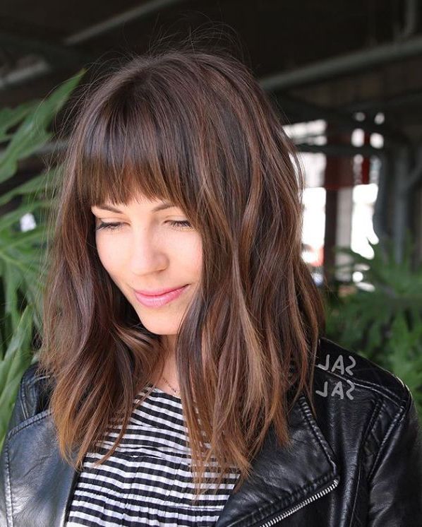 The Most Flattering Hairstyles For Long Faces Within Most Up To Date Blunt Lob Haircuts With Straight Bangs (View 8 of 25)