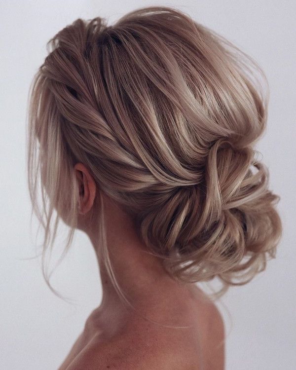 20 Trendy Low Bun Wedding Updos And Hairstyles 2023 Inside Fancy Loose Low Updo (View 13 of 25)