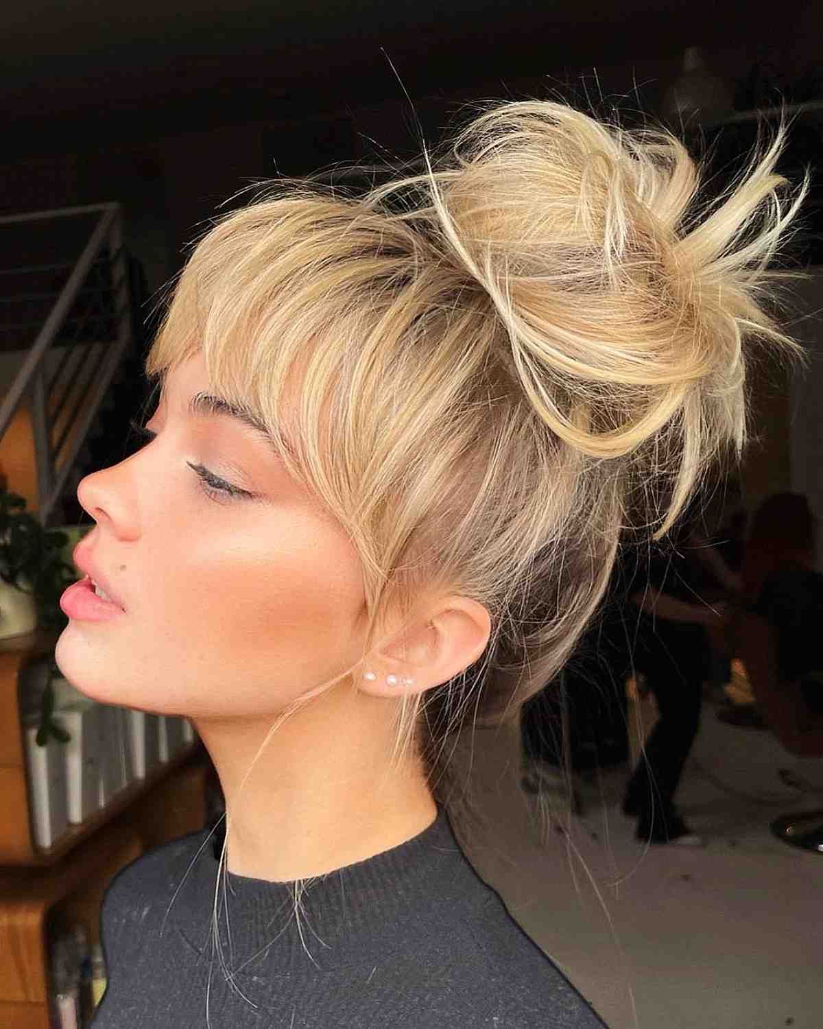 22 Sexiest Messy Updos You'll See In 2023 Inside High Bun With A Side Fringe (View 20 of 25)