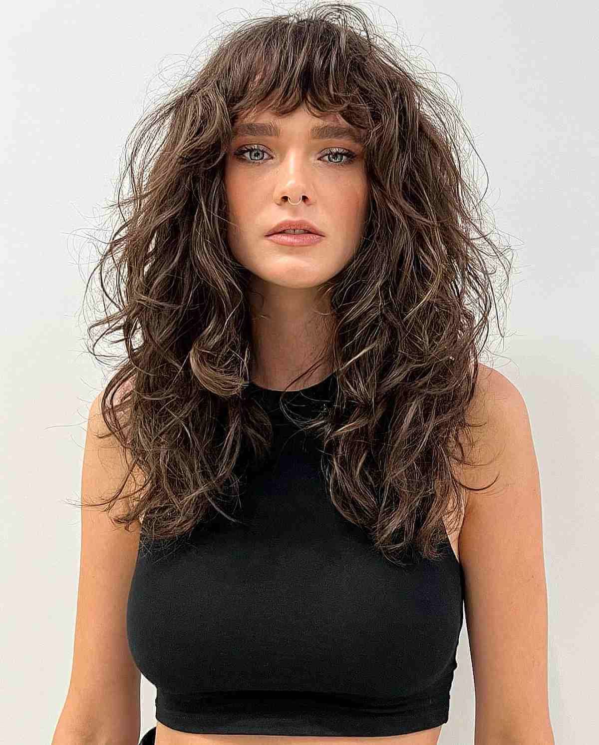 32 Ways To Pair Wavy Hair With Bangs For A Super Flattering Look Intended For Most Popular Slightly Curly Hair With Bangs (View 6 of 18)