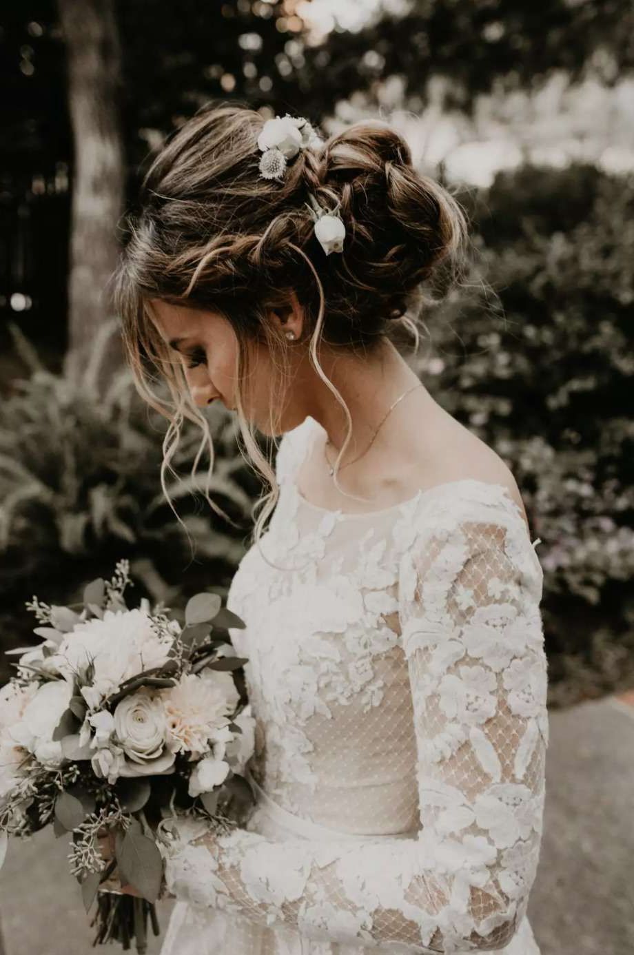 35 Wedding Updos Perfect For Long Hair Pertaining To Low Flower Bun For Long Hair (View 18 of 25)
