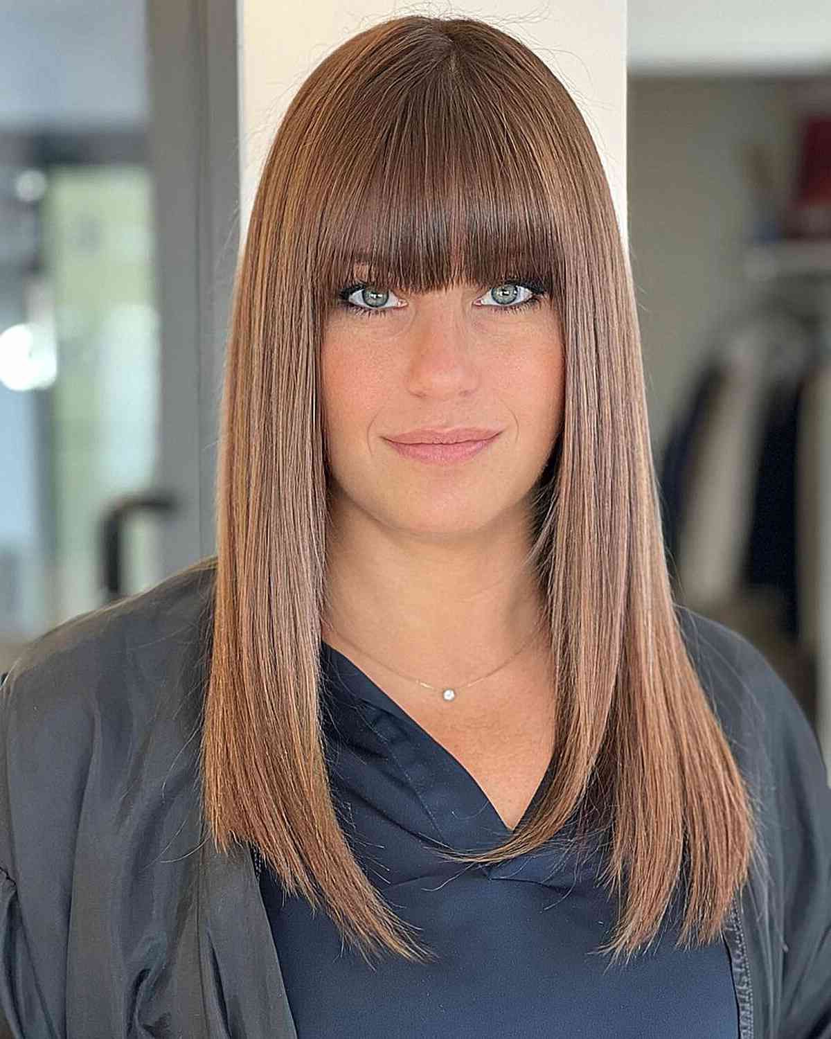 38 Cutest Ways To Pair Straight Hair With Bangs Regarding Most Recently Medium Straight Sleek Hair With A Fringe (View 4 of 18)