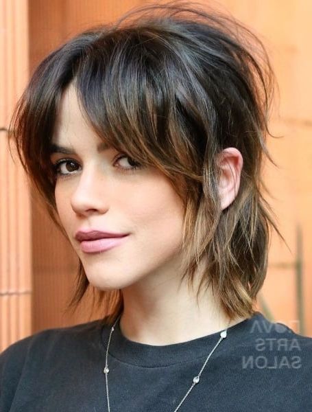 40 Best Mullet Haircuts For Women In 2023 – The Trend Spotter Inside Recent Shoulder Grazing Mullet With Choppy Bangs (View 7 of 18)