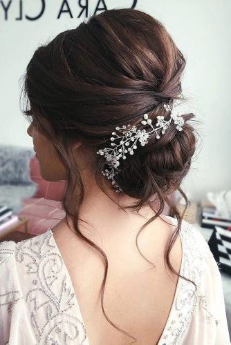 40 Ways To Wear Wedding Flower Crowns & Hair Accessories | Low Bun Wedding  Hair, Indian Bridal Hairstyles, Bride Hairstyles Pertaining To Low Flower Bun For Long Hair (Photo 1 of 25)
