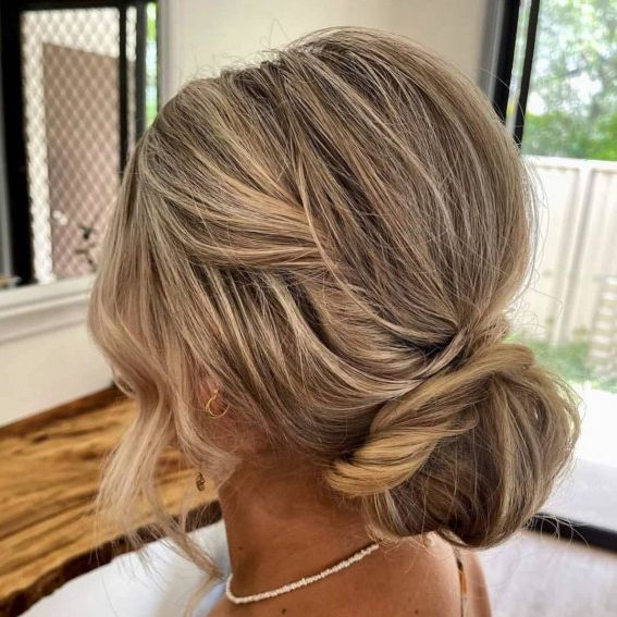 43 Stunning Updo Hairstyles 2022 : Twist + Wrap Low Bun Throughout Fancy Loose Low Updo (View 19 of 25)