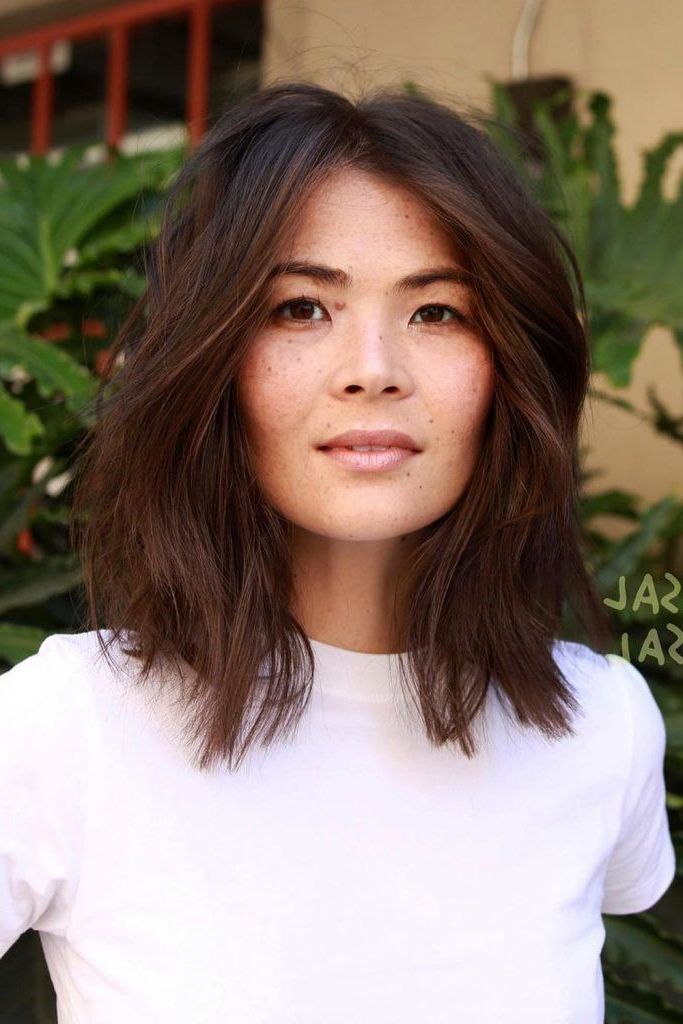 45+ Versatile Medium Bob Haircuts To Try With Medium Bob With Long Parted Bangs (View 16 of 25)