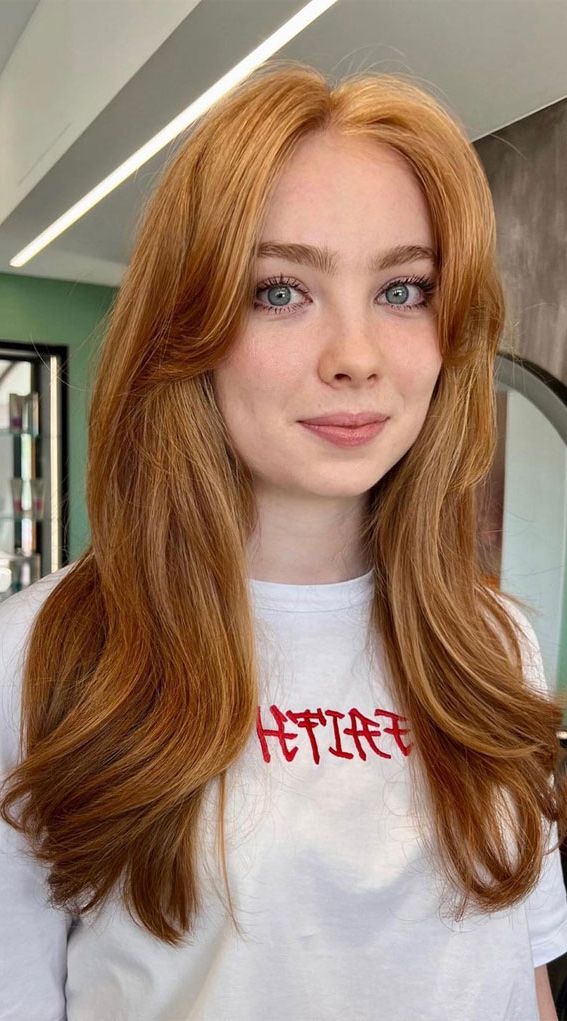 49 Autumn 2022 Hair Colour Trends : Amber Long Hair With Curtain Bangs Inside Most Current Lush Curtain Bangs For Mid Length Ginger Hair (Photo 10 of 18)