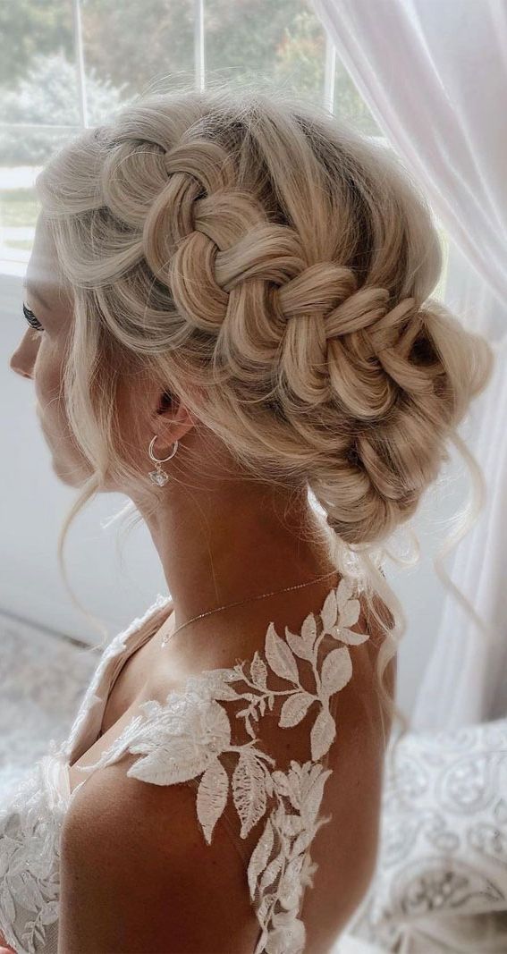 50 Amazing Ways To Style An Updo In 2022 : Blonde Braided Low Bun Regarding Braided Updo For Blondes (View 23 of 25)