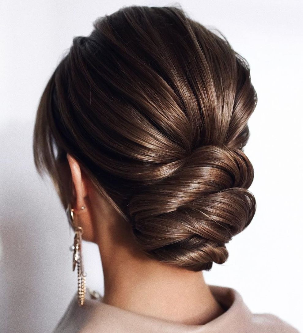 50 New Updo Hairstyles For Your Trendy Looks In 2023 – Hair Adviser Pertaining To Low Formal Bun Updo (View 17 of 25)