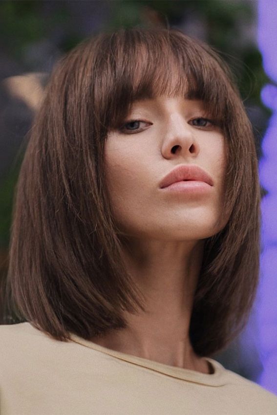 52 Best Bob Haircut Trends To Try In 2023 : Layered Lob + Fringe Pertaining To Best And Newest Shoulder Length Bob With Bangs (Photo 16 of 18)