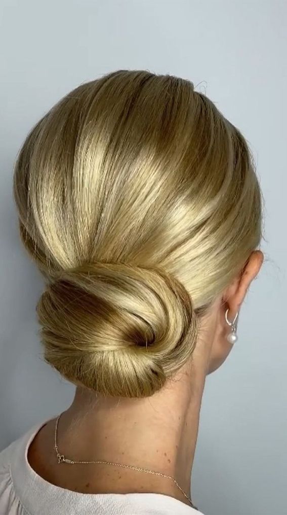 75 Trendiest Updo Hairstyles 2021 : Sophisticated Textured Low Bun For Long  Hair Inside Low Chignon Updo (View 27 of 28)