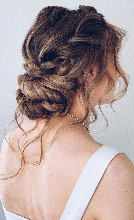 75 Trendiest Updo Hairstyles 2021 : Trendy Twisted Bun With Loose Style With Regard To Fancy Loose Low Updo (Photo 10 of 25)