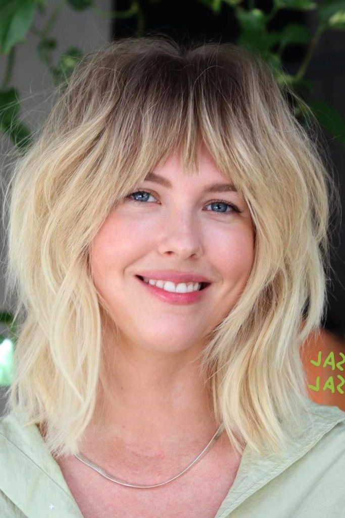 80 Medium Length Hairstyles: Trends And Ideas For Women In Most Current Wavy Medium Length Hair With Bangs (View 17 of 18)