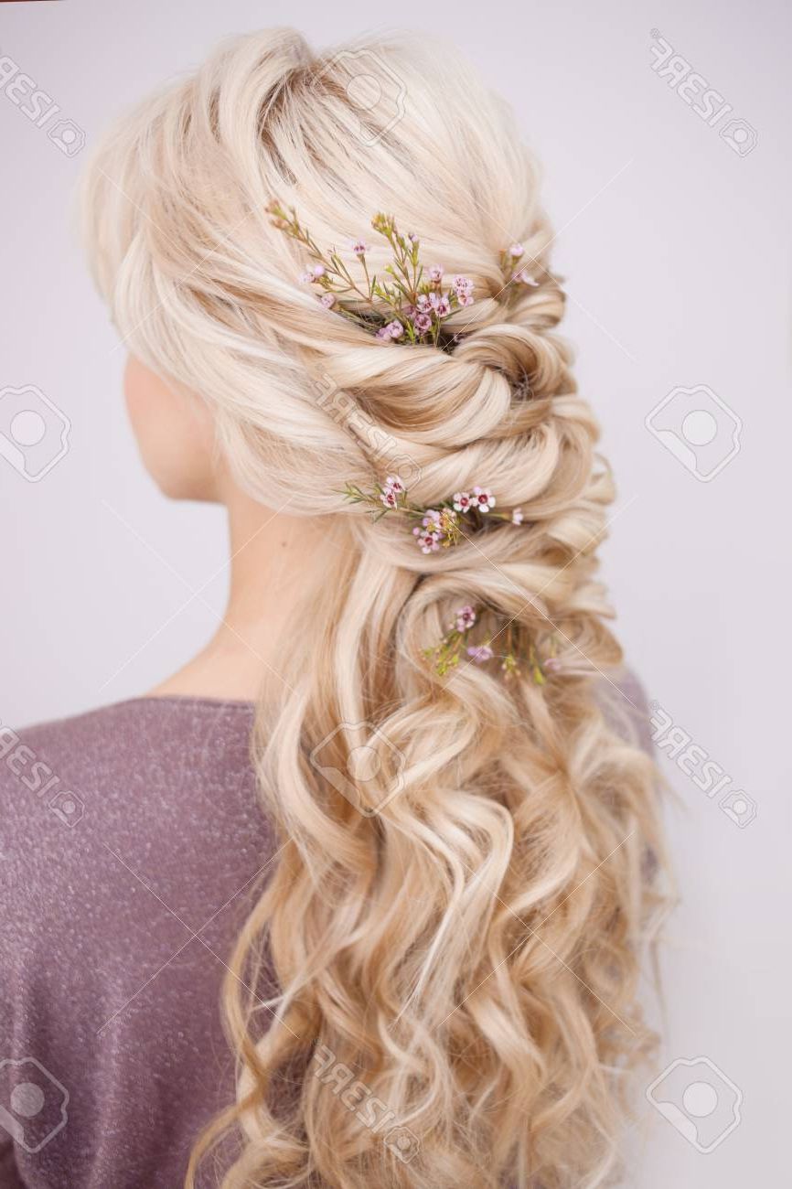 Back View Of An Elegant Trendy Hairstyle, Interlacing Curls And Decorating  With Flower Petals. Beautiful And Well Groomed Blonde Hair Stock Photo,  Picture And Royalty Free Image. Image  (View 10 of 10)