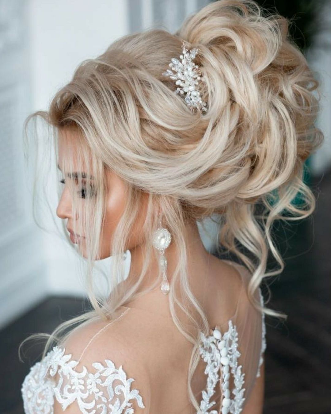 Beautifully Volume Updo And Elegant Hair Accessory (View 4 of 25)