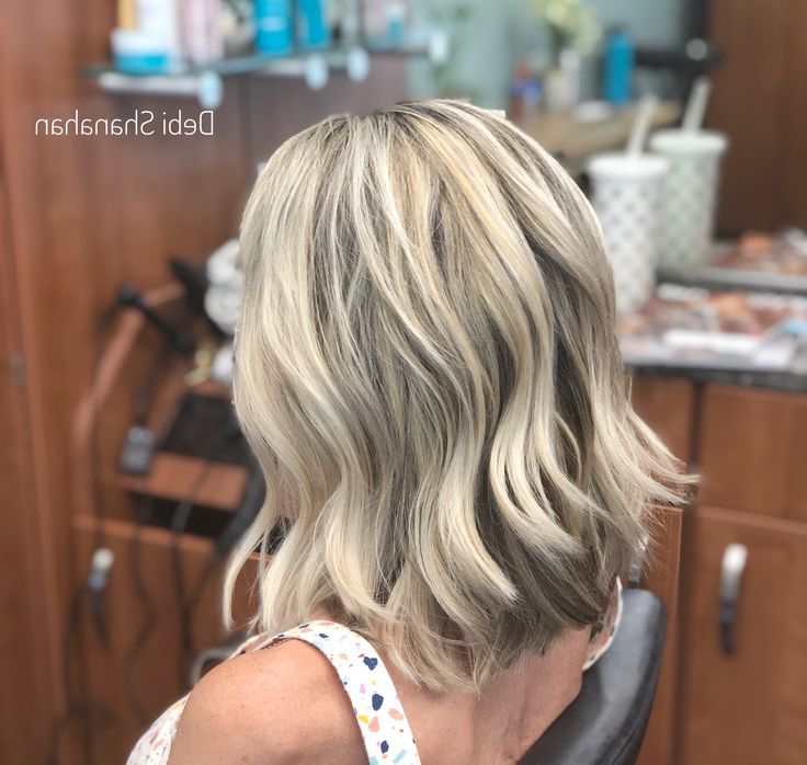 Choppy Lob With Long Layers And Super Light Ash Blonde Highlights (View 3 of 25)