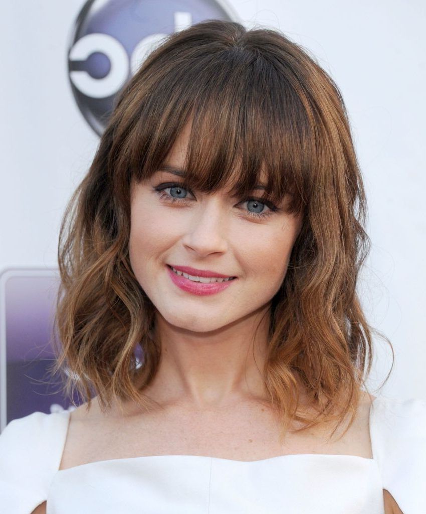 Curtain Bangs: A Trendy And Versatile Hairstyle For Every Face Shape Intended For Most Up To Date Thick Curtain Bangs (Photo 17 of 20)