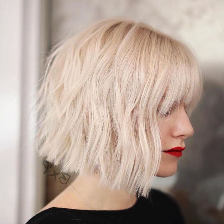 The Best Short Bob Hairstyles To Try In 2023 Regarding Newest Edgy Blunt Bangs For Shoulder Length Waves (View 14 of 18)