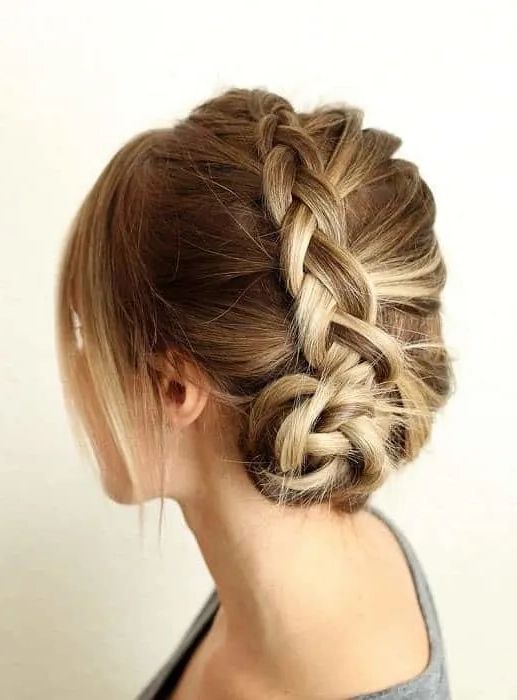 Top 17 Side Braided Bun Hairstyles To Try In 2023 Pertaining To Low Braided Bun With A Side Braid (View 24 of 25)