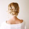 Undone Low Bun Bridal Hairstyles With Floral Headband (Photo 16 of 25)