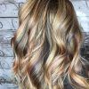 Pearl Blonde Bouncy Waves Hairstyles (Photo 22 of 25)