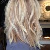 Textured Medium Length Look Blonde Hairstyles (Photo 10 of 25)