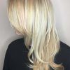 Blonde Textured Haircuts With Angled Layers (Photo 15 of 25)