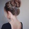 Messy Bun Prom Hairstyles With Long Side Pieces (Photo 23 of 25)