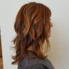 Medium Hairstyles With Perky Feathery Layers (Photo 8 of 25)