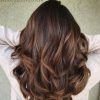 Mid-Back Brown U-Shaped Haircuts With Swoopy Layers (Photo 17 of 25)