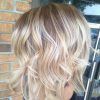 Curly Angled Blonde Bob Hairstyles (Photo 4 of 25)