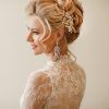 Voluminous Chignon Wedding Hairstyles With Twists (Photo 12 of 25)