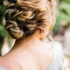 Curly Ash Blonde Updo Hairstyles With Bouffant And Bangs (Photo 22 of 25)