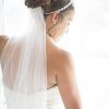 Bridal Chignon Hairstyles With Headband And Veil (Photo 6 of 25)