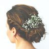Undone Low Bun Bridal Hairstyles With Floral Headband (Photo 3 of 25)