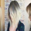 Striking Angled Platinum Lob Blonde Hairstyles (Photo 8 of 25)