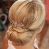 Sleek Bridal Hairstyles With Floral Barrette (Photo 3 of 25)