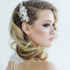 Sleek Bridal Hairstyles With Floral Barrette (Photo 8 of 25)