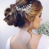Sculpted Orchid Bun Prom Hairstyles (Photo 11 of 25)