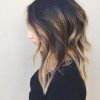 Medium Hairstyles With Perky Feathery Layers (Photo 9 of 25)