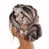 Bun Updo With Accessories For Thick Hair (Photo 4 of 25)