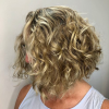 Curly Lob Haircuts With Feathered Ends (Photo 23 of 25)